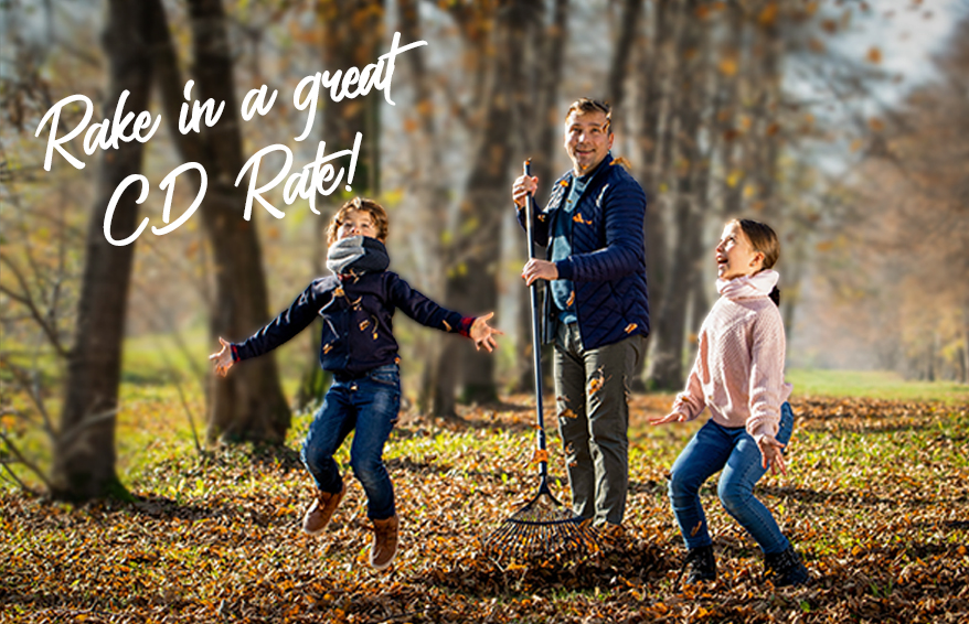 Family jumping in the leaves
