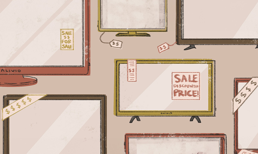 TVs for sale on a wall