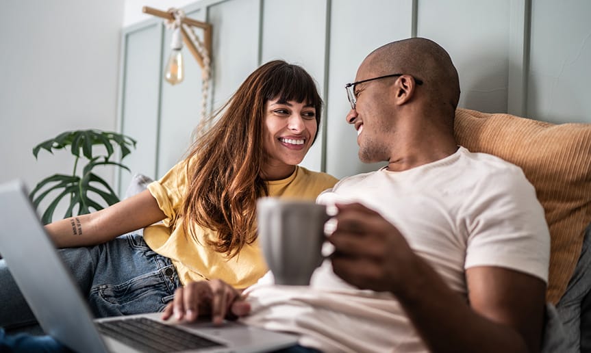 A man and woman looking at eachother.